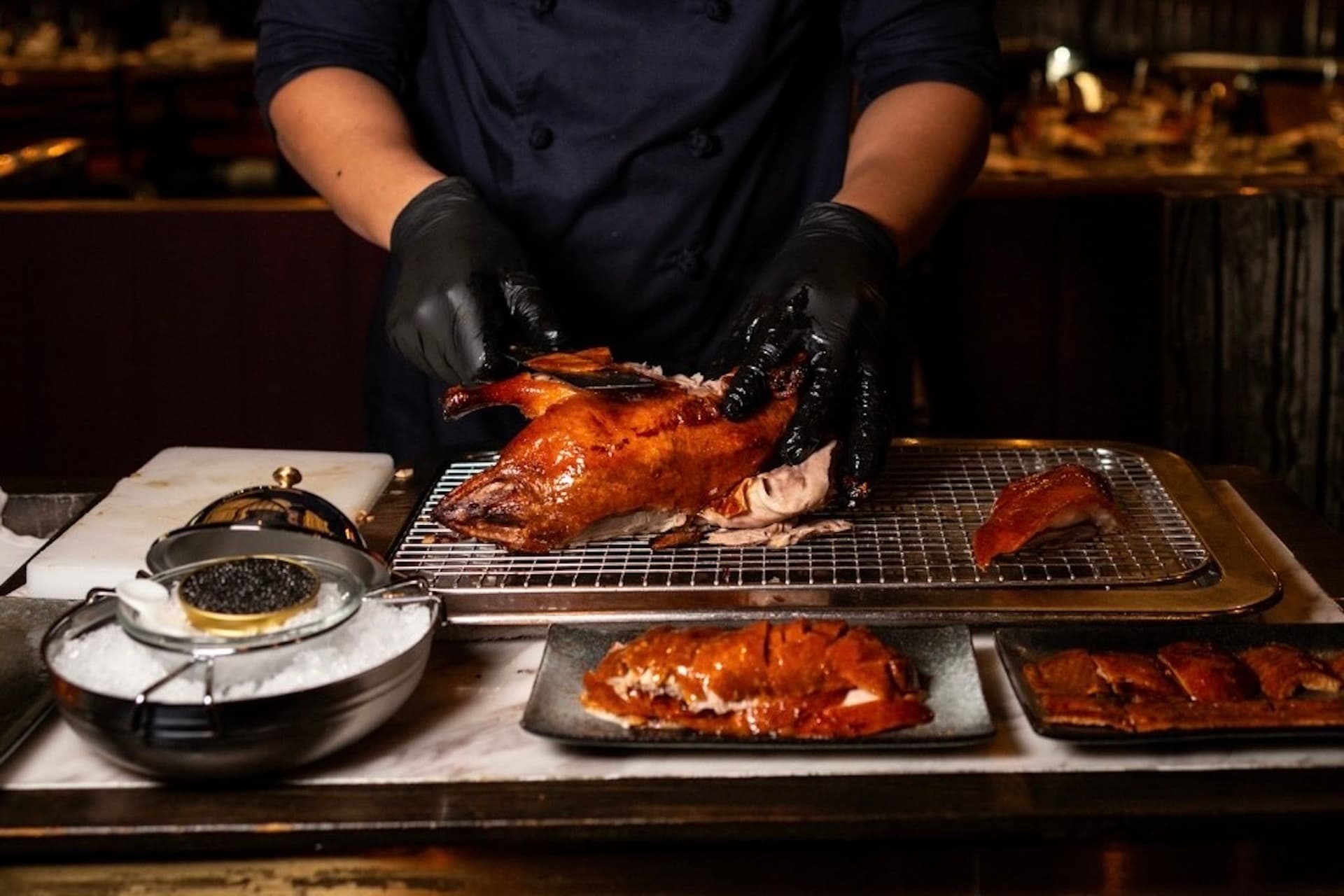https://display.dailyhive.com/uploads/2025/10/Experience-our-award-winning-Signature-Apple-Wood-Roasted-Peking-Duck-the-perfect-balance-of-cr-2.jpg