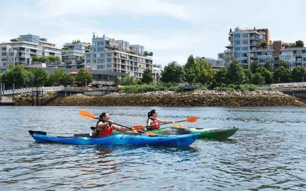 https://www.vancouverplanner.com/wp-content/uploads/2024/01/kayaking-in-false-creek-for-summer-activities-1024x640.jpg