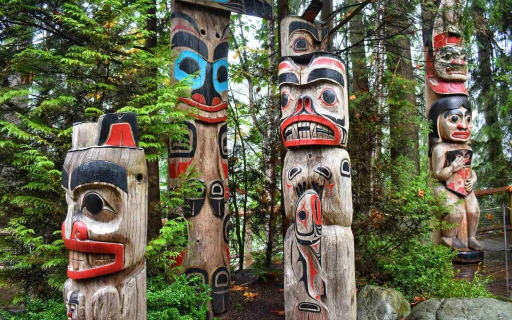 https://www.vancouverplanner.com/wp-content/uploads/2024/05/capilano-suspension-bridge-totem-poles-1024x640.jpeg